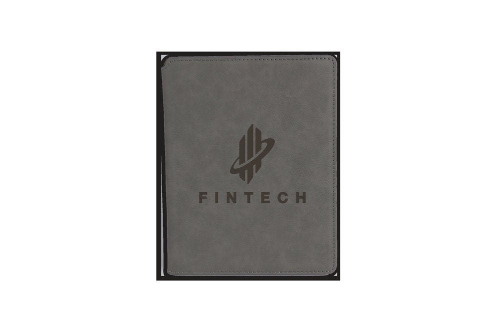 Gray leather Fintech branded portfolio or notebook cover on a plain background